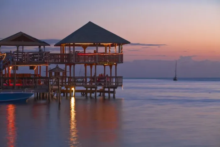 Framed Print : Honduras, Bay Islands, Roatan, West End, Fosters bar and restaurant at sunset Framed Print : Honduras, Bay Islands, Roatan, West End, Fosters bar and restaurant at sunset