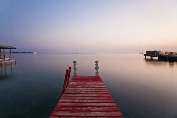 Framed Print : Honduras, Bay Islands, Utila, Red jetty at sunset Framed Print : Honduras, Bay Islands, Utila, Red jetty at sunset