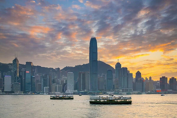 Hong Kong skyline, skyscrapers on Hong Kong Island skyline at sunset seen from Tsim