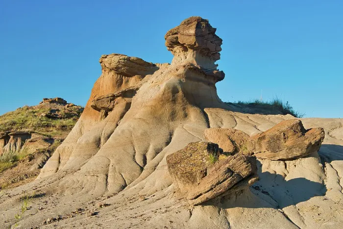 Framed Print : Hoodoo with fallen caps, Badlands, UNESCO World Heritage Site, Dinosaur Provincial Park, Alberta, Canada Framed Print : Hoodoo with fallen caps, Badlands, UNESCO World Heritage Site, Dinosaur Provincial Park, Alberta, Canada