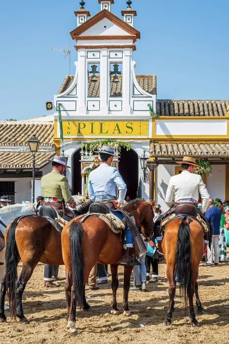 Framed Print : Horse riders in front of the Hermandad (Confraternity) de Pilas house, Romeria de El Rocio pilgrimage, El Rocio, Huelva, Andalusia, Spain Framed Print : Horse riders in front of the Hermandad (Confraternity) de Pilas house, Romeria de El Rocio pilgrimage, El Rocio, Huelva, Andalusia, Spain