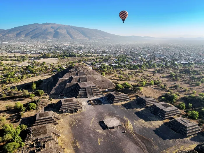 Framed Print : Hot air balloon flying over the Avenue of the Dead and the Pyramid of the Moon at sunrise, aerial view, Teotihuacan, Mexico State, Mexico Framed Print : Hot air balloon flying over the Avenue of the Dead and the Pyramid of the Moon at sunrise, aerial view, Teotihuacan, Mexico State, Mexico