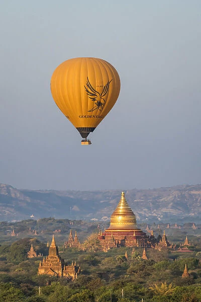 A hot air balloon flying over Dhammayazika temple, UNESCO, Pwasaw, Old Bagan