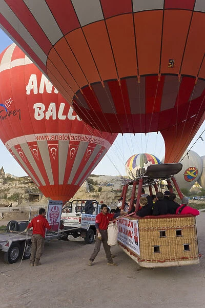 Hot Air Balloon being inflated for take off, near Goreme, Cappadocia, Anatolia, Turkey