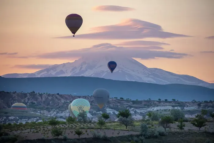 Framed Print : Hot air balloons at dawn in front of Mount Erciyes, Goreme, Cappadocia, Nevsehir Province, Central Anatolia, Turkey Framed Print : Hot air balloons at dawn in front of Mount Erciyes, Goreme, Cappadocia, Nevsehir Province, Central Anatolia, Turkey