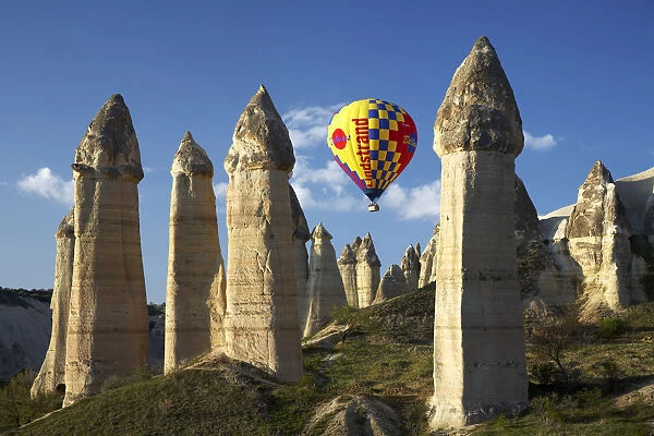 Hot Air Balloons & Fairy Chimneys in Honey Valley, near Goreme, Cappadocia, Turkey