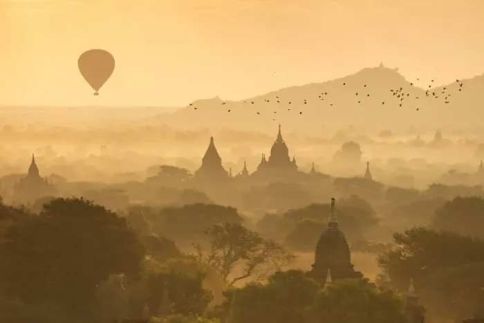 Framed Print : Hot air balloons fly over the temples of Bagan at sunrise on a misty morning, Myanmar Framed Print : Hot air balloons fly over the temples of Bagan at sunrise on a misty morning, Myanmar