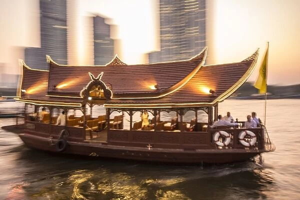 Hotel shuttle boat on the Chao Phraya River outside the Mandarin Oriental, Bangkok