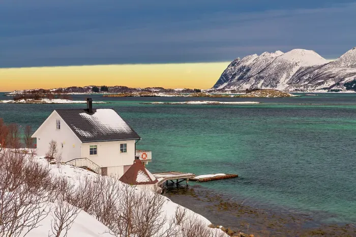 Framed Print : House overlooking Lavollsfjorden in Winter, Senja, Norway Framed Print : House overlooking Lavollsfjorden in Winter, Senja, Norway