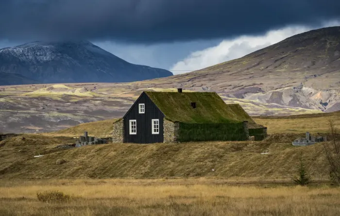Framed Print : House with roof covered by grass against mountains, South Iceland, Iceland Framed Print : House with roof covered by grass against mountains, South Iceland, Iceland