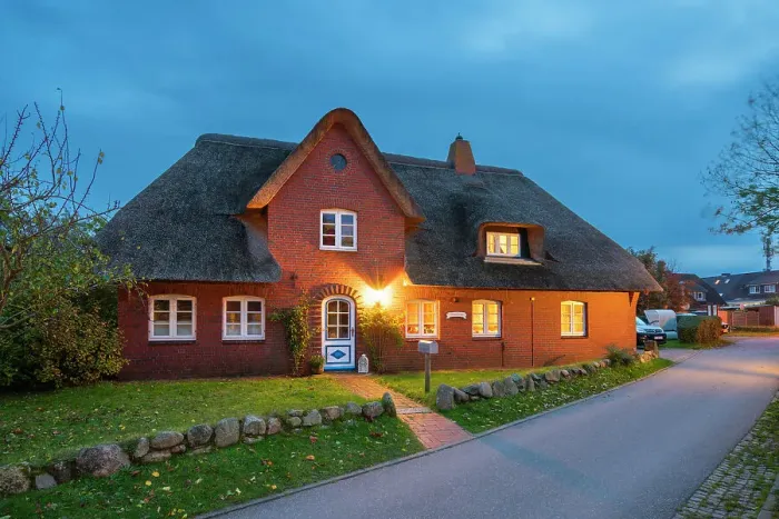 Framed Print : House with traditional thatched roof at twilight, Nebel, Amrum island, Nordfriesland, Schleswig-Holstein, Germany Framed Print : House with traditional thatched roof at twilight, Nebel, Amrum island, Nordfriesland, Schleswig-Holstein, Germany