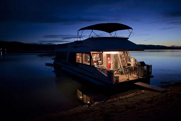 A houseboat on Shushwap Lake in the British Columbia interior, Canada