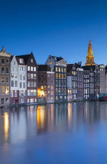 Framed Print : Houses along Damrak at dusk, Amsterdam, Netherlands Framed Print : Houses along Damrak at dusk, Amsterdam, Netherlands