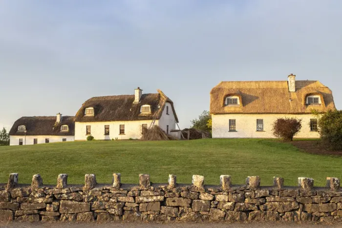 Framed Print : Houses near the Dunguaire Castle. County Galway, Connacht province, Ireland Framed Print : Houses near the Dunguaire Castle. County Galway, Connacht province, Ireland