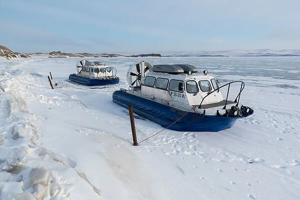 Two hovercrafts on the bank of the lake Baikal, Irkutsk region, Siberia, Russia
