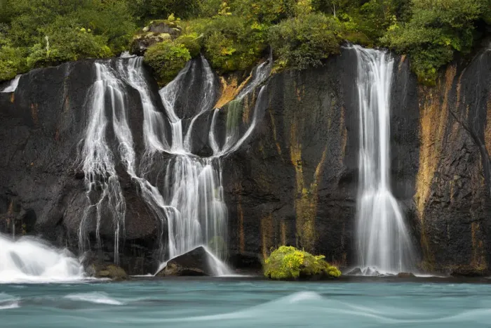 Framed Print : Detail of Hraunfossar waterfall falling from rocks in forest, Western Iceland, Iceland
