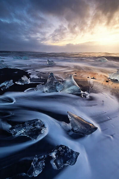 the ice blocks of the famous Black Sand Beach, Jokusarloon, Iceland