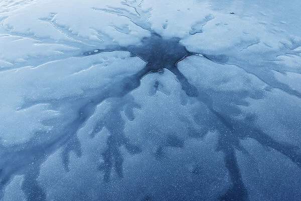 Ice patterns on a frozen lake surface, Emilia Romagna, Italy