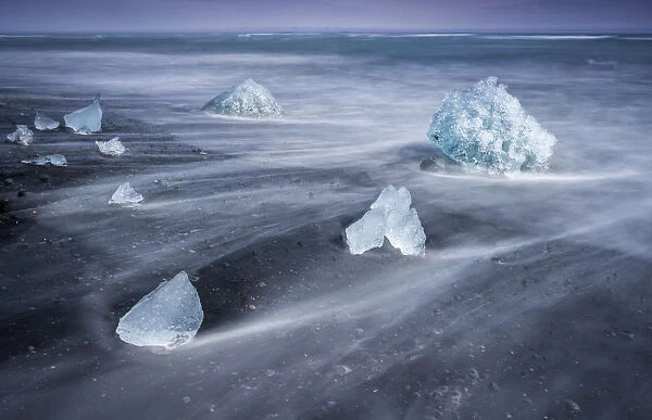 Ice on shore at Diamond Beach near Jokulsarlon glacier lagoon, South Iceland, Iceland