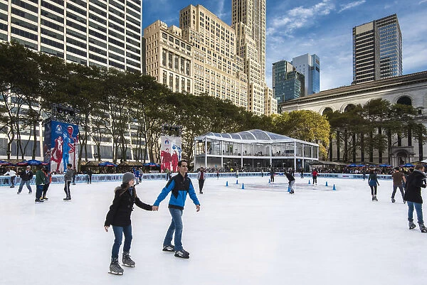 Ice skating in Bryant Park, Manhattan, New York, USA