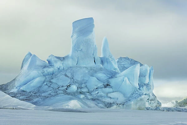 Iceberg frozen in pack ice - Antarctica, Antarctic Peninsula, Snowhill Island