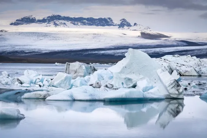 Framed Print : Icebergs floating at Jokulsarlon glacier lagoon against snowcapped mountains, Vatnajokull Framed Print : Icebergs floating at Jokulsarlon glacier lagoon against snowcapped mountains, Vatnajokull