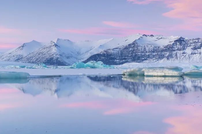 Framed Print : Icebergs on Jokulsarlon glacier lagoon at sunset, with snow-covered mountains in the distance, South Iceland Framed Print : Icebergs on Jokulsarlon glacier lagoon at sunset, with snow-covered mountains in the distance, South Iceland