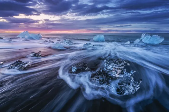 Framed Print : Icebergs being washed ashore on Breidamerkursandur black sands