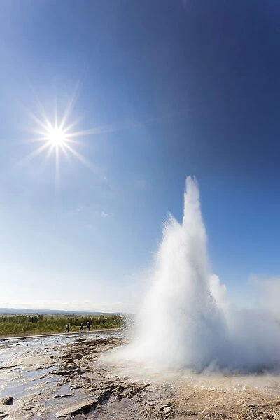 Iceland, Geysir area, Stokkur geyser erupting in a sunny day
