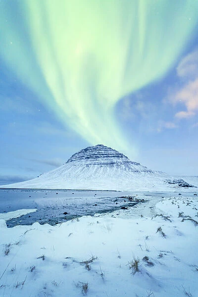Iceland: Kirkjufell under the green Aurora Borealis sky