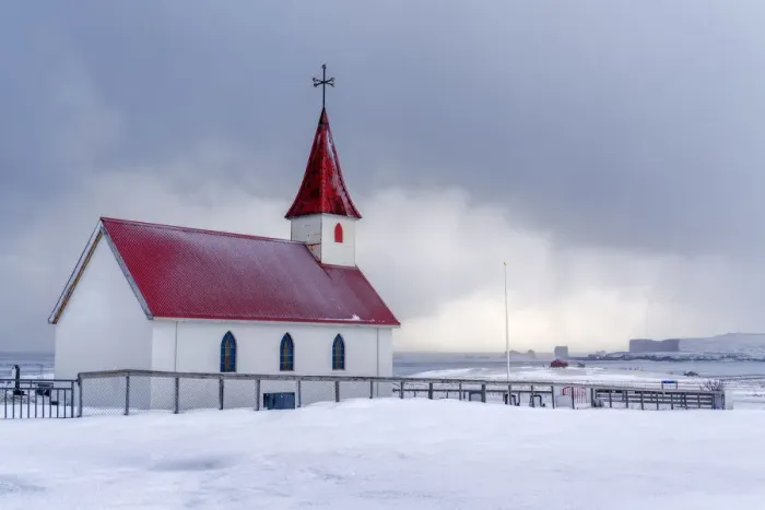 Framed Print : Iceland: the little church of Reynisfjara looking at the storm on the seashore Framed Print : Iceland: the little church of Reynisfjara looking at the storm on the seashore
