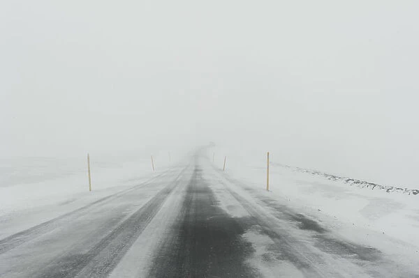 Iceland. Mountain road with snow