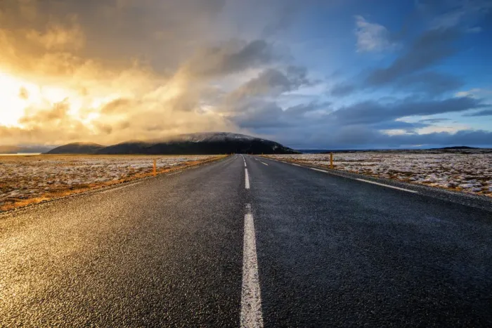 Framed Print : Iceland, Northern Europe. A paved road with dramatic sky Framed Print : Iceland, Northern Europe. A paved road with dramatic sky