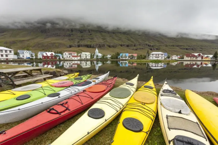Framed Print : Iceland, South Iceland, Coloured kayaks in the fjord of Seyoisfjorour