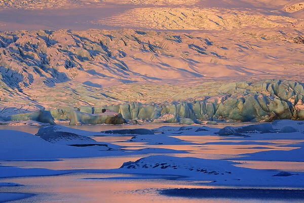 Iceland, South Iceland, A detail of colourful Vatnaj??l ice at the first light of sunrise