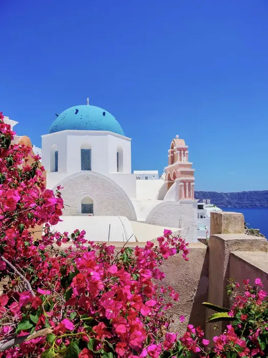 Framed Print : Iconic blue domed church of Resurrection of the Lord, Oia Village, Santorini or Thira Island, Cyclades, Greece