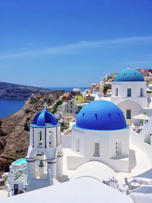 Framed Print : Iconic blue domed churches of Saint Spyridon and Resurrection of the Lord, Oia Village, Santorini or Thira Island, Cyclades, Greece