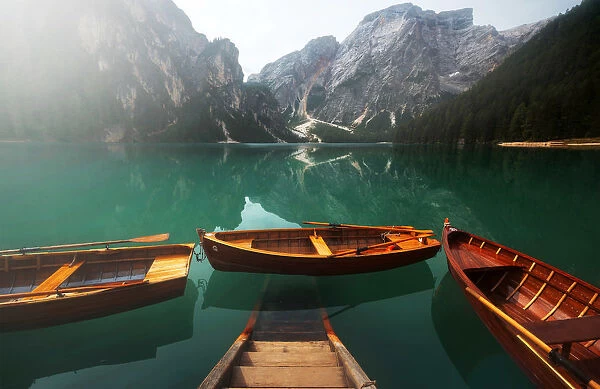 The iconic Braies lake (Pragser Wildsee) during a summer morning in the Dolomites, Italy