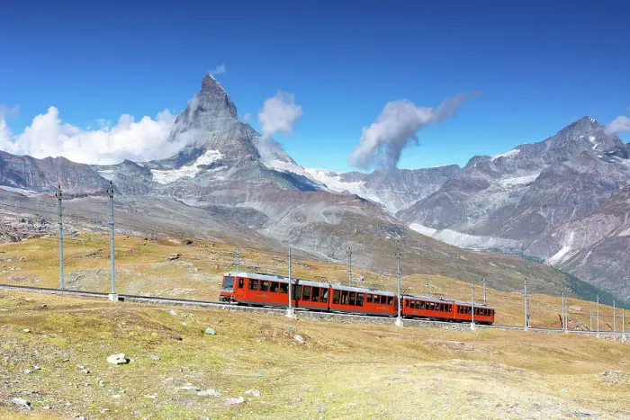 Framed Print : the iconic red train over the Gornegrat railway, with the Matterhorn mountain in background, Zermatt, Canton of Valais, Switzerland