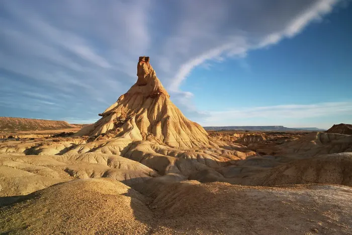 Framed Print : the iconic rock formation called Castel de Tierra during a warm summer sunrise, Bardenas Reales Natural Park, Navarra, Spain