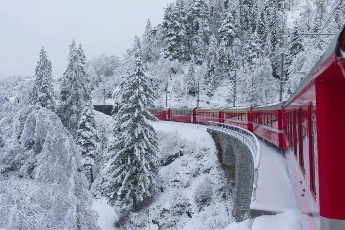 Framed Print : Iconic swiss red Bernina Express train in winter landscape and pristine snow. Swizerland