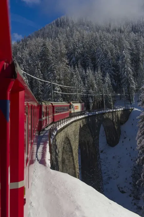Framed Print : Iconic swiss red Bernina Express train in winter landscape and pristine snow. Swizerland