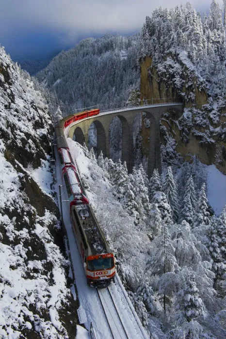 Framed Print : Iconic swiss red Bernina Express train in winter landscape and pristine snow. Swizerland