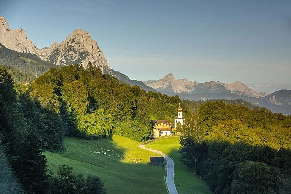The iconic Wamberg Church, with Mount Alpspitze and Zugspitze beyond, Wamberg