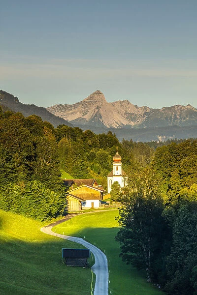 The iconic Wamberg Church, with Mount Alpspitze and Zugspitze beyond, Wamberg