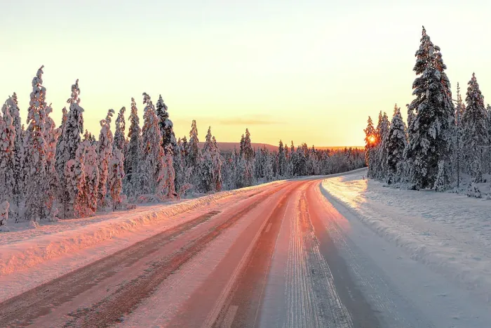 Framed Print : Empty icy road in the winter forest covered with snow at sunset, Iso Syote, Lapland, Finland Framed Print : Empty icy road in the winter forest covered with snow at sunset, Iso Syote, Lapland, Finland