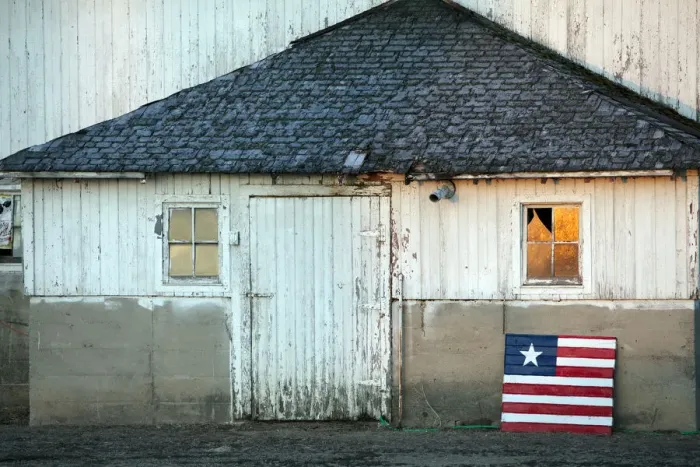 Framed Print : Idaho, USA. An american flag in front of a barn Framed Print : Idaho, USA. An american flag in front of a barn