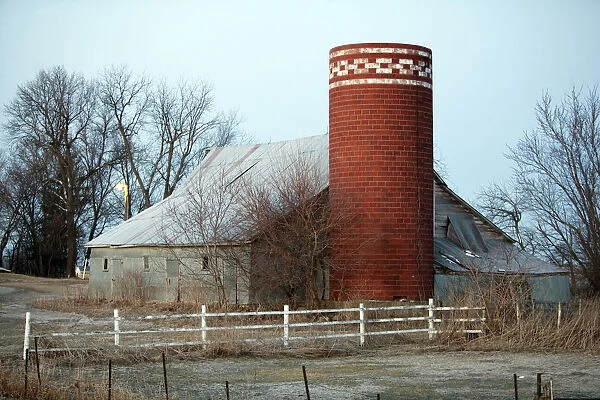 Idaho, USA. A barn with a brick silo
