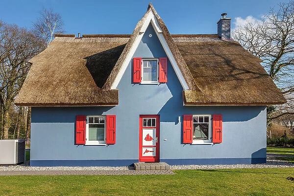 Idyllic blue thatched cottage in Wieck am Darss, Mecklenburg-West Pomerania, Baltic Sea, North Germany, Germany