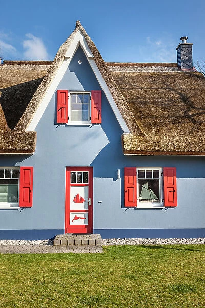 Idyllic blue thatched cottage in Wieck am Darss, Mecklenburg-West Pomerania, Baltic Sea, North Germany, Germany